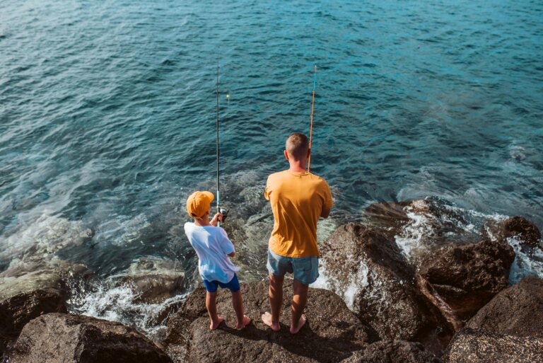 man and son fishing