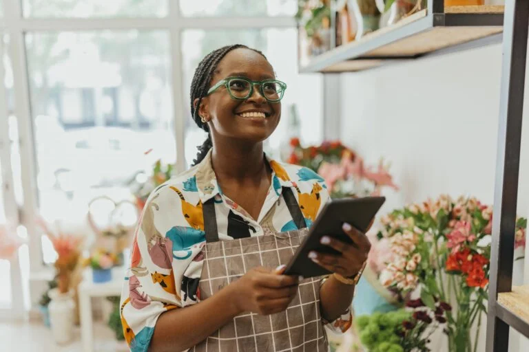 smiling woman in a florist shop